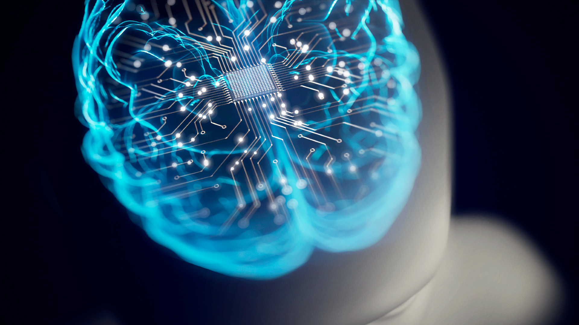 A blue glowing brain inside a drawn head against a black background. 