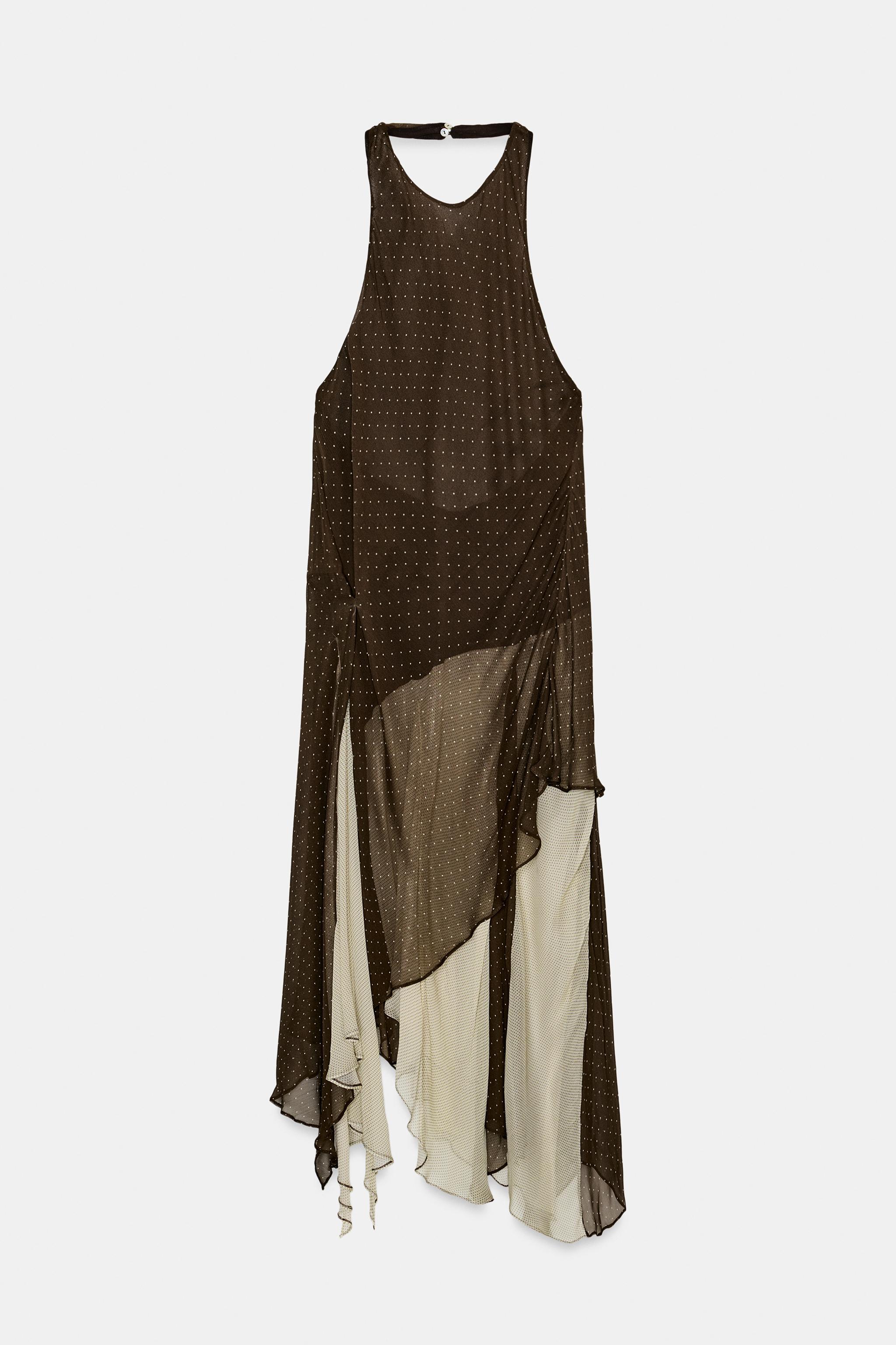 Parece un dise�o de boutique francesa: el vestido de lunares midi con bajo asim�trico de Zara est� en tendencia y es la compra maestra de esta temporada para tus eventos de primavera y verano