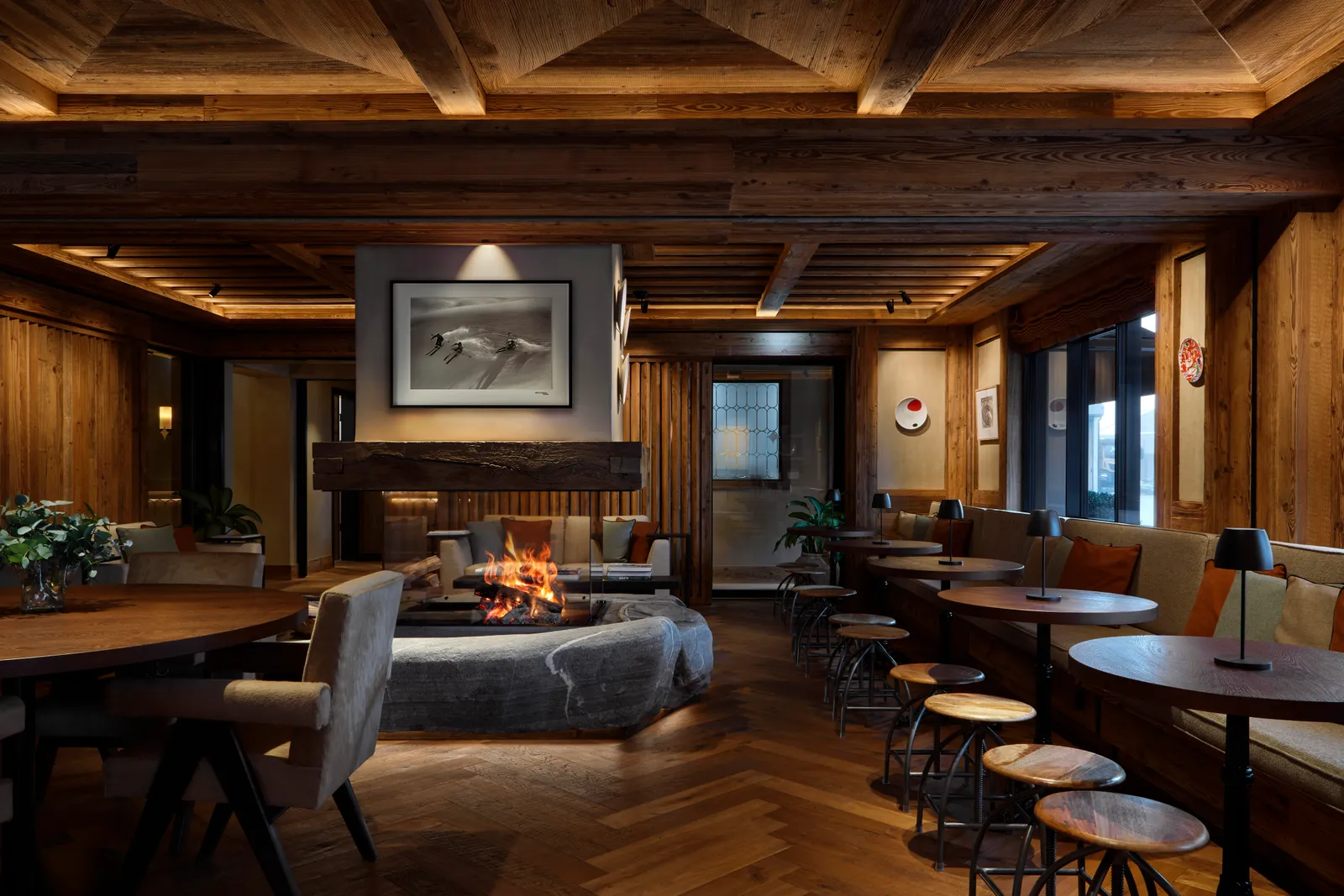 Image may contain Indoors Interior Design Wood Hardwood Fireplace Stained Wood and Wood Panels