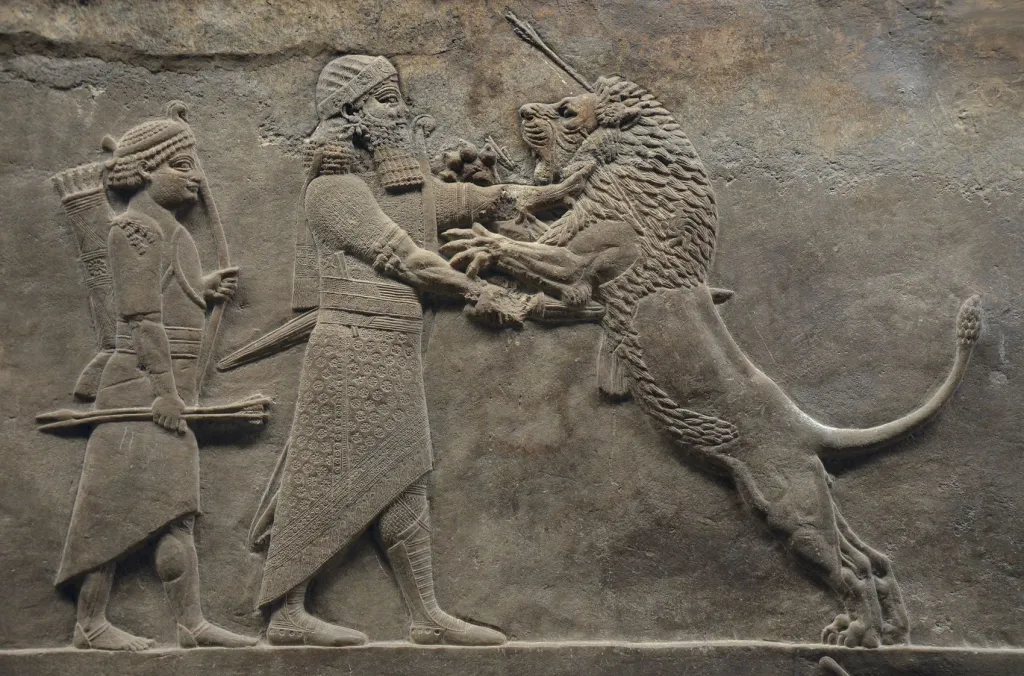 Relieve de Asurbanipal matando a un león