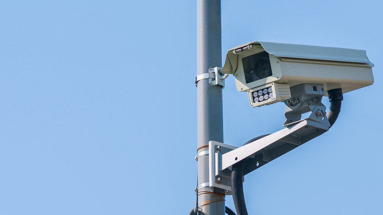 a speed camera mounted on a pole