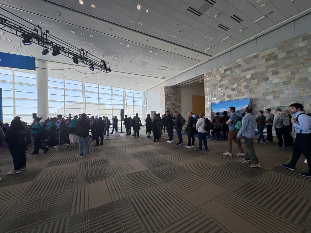 Attendees line up for the session "Apply Agentforce Vibes' Advanced Features"