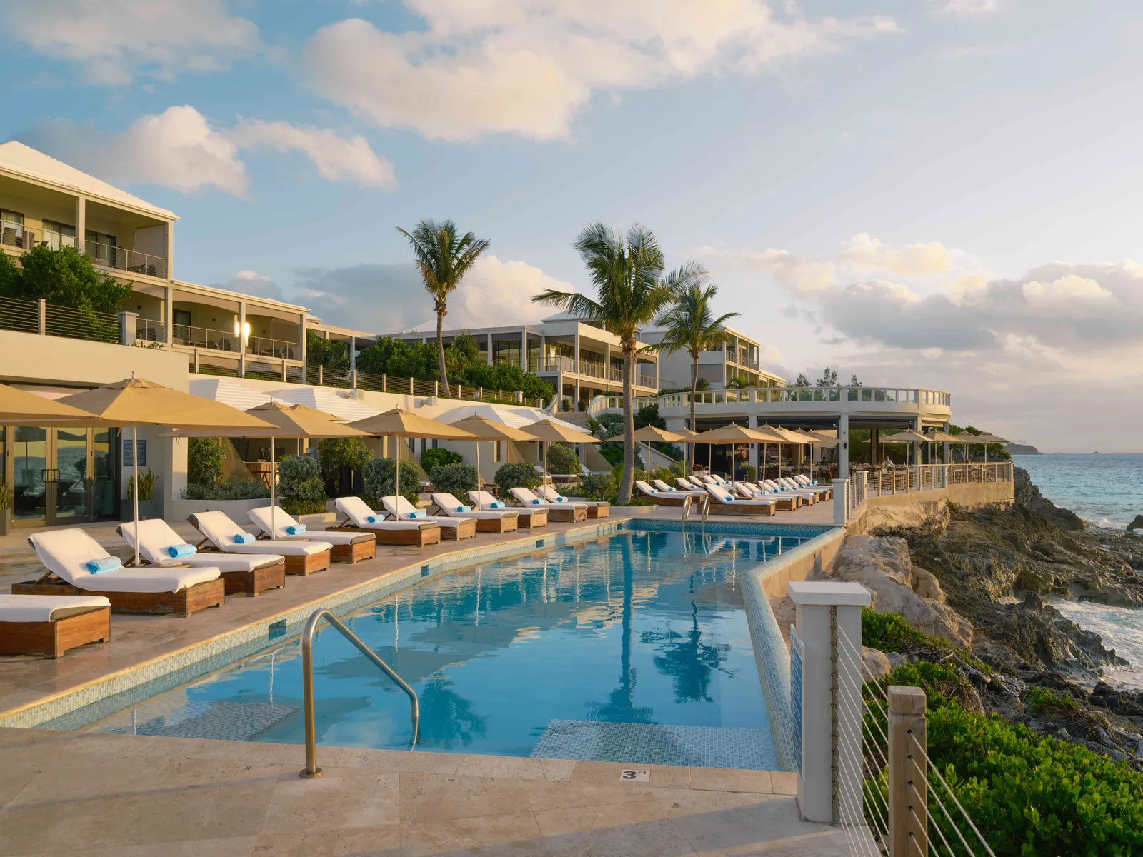 Image may contain Architecture Building Hotel Resort Pool Water Swimming Pool Waterfront and Outdoors