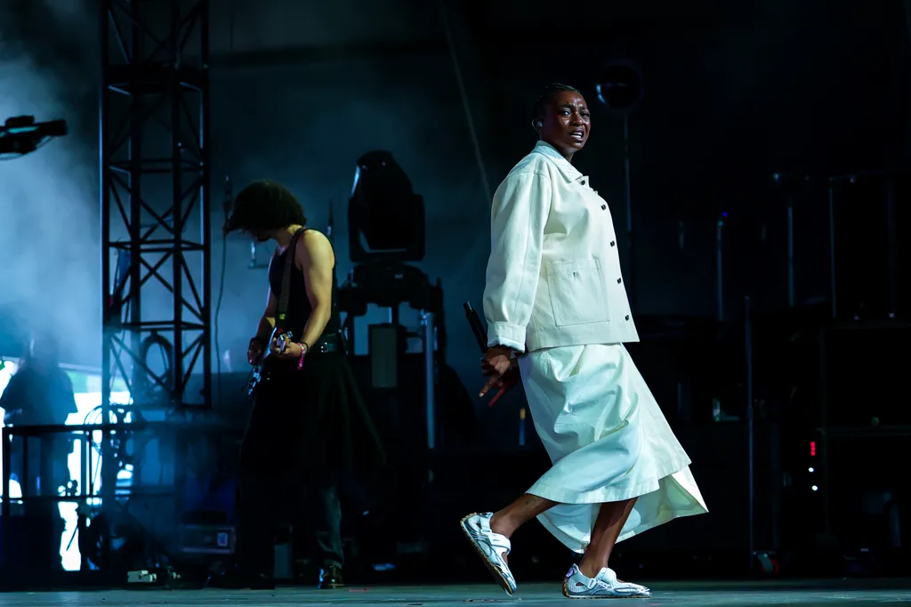 Image may contain Little Simz Adult Person Performer Solo Performance Clothing Footwear Shoe Face and Head