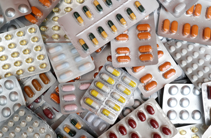Illustrative photo shows various medicine pills in their original packaging