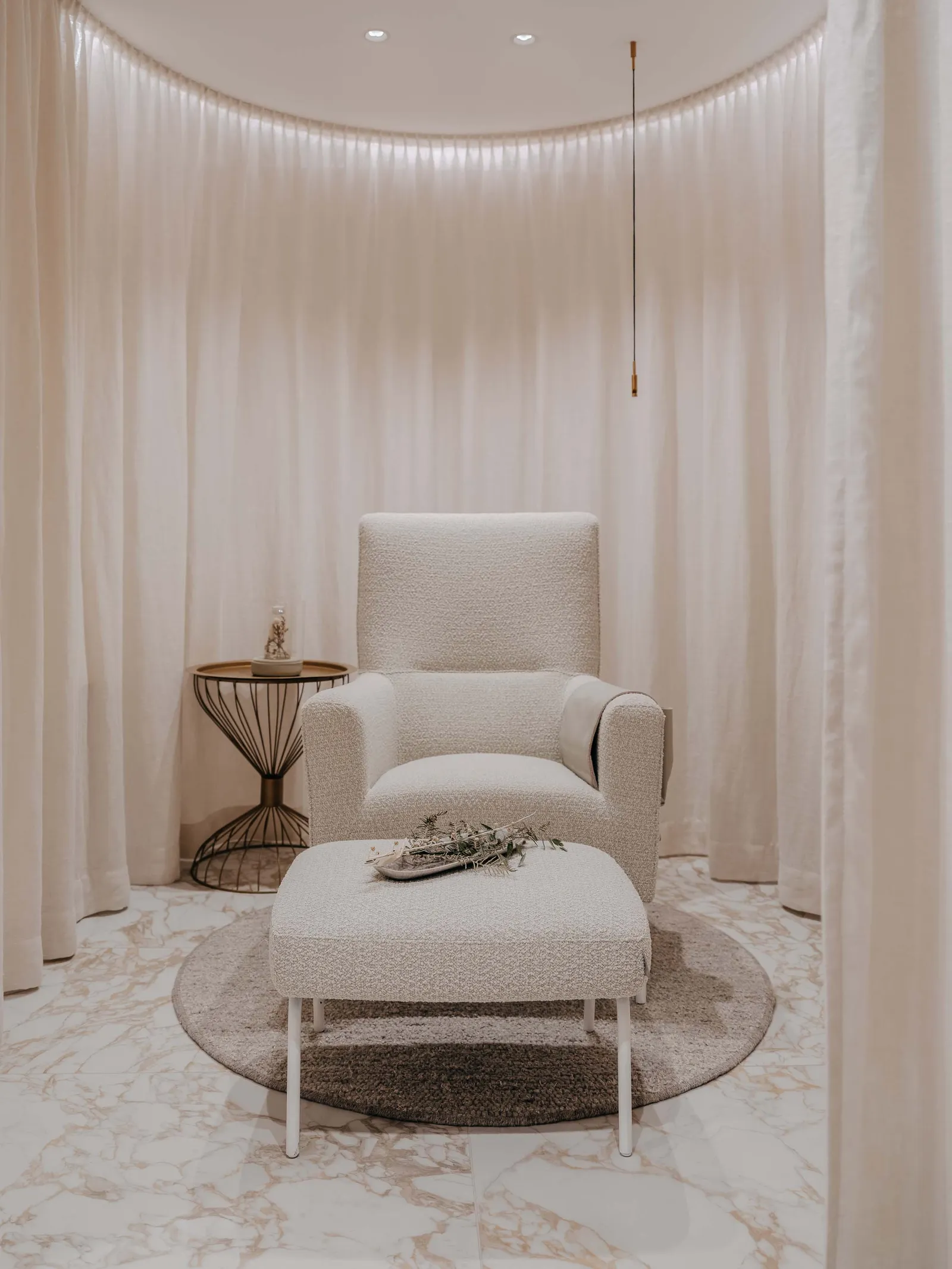 Image may contain Furniture Home Decor Rug Floor and Chair
