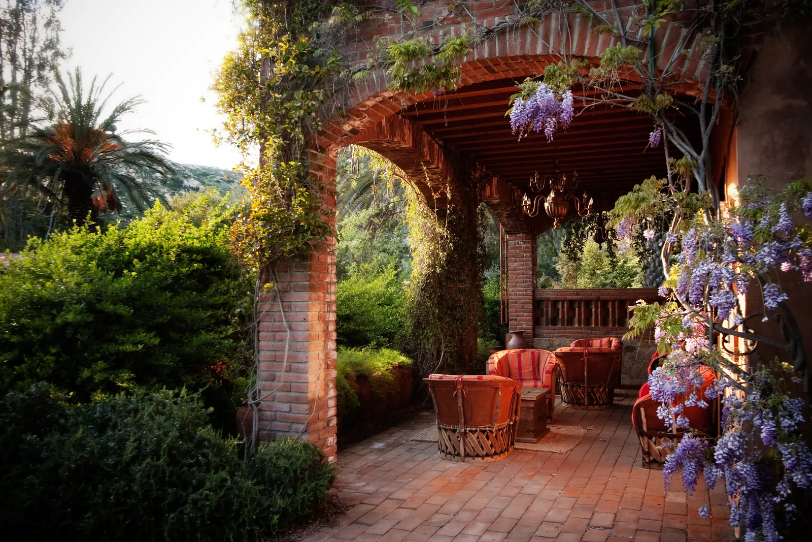 Image may contain Architecture Building House Housing Villa Backyard Nature Outdoors Yard Garden Porch and Patio