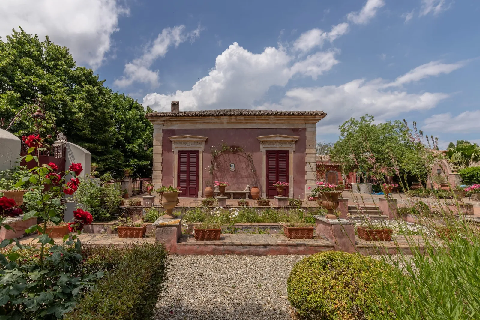 Image may contain Architecture Building House Housing Villa Plant Portico Hacienda and Outdoors