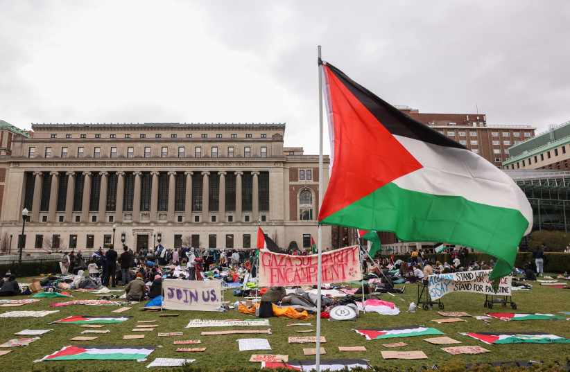 Demonstrators sit in an encampment as they protest in solidarity with Pro-Palestinian organizers on the Columbia University campus, amid the ongoing conflict between Israel and Hamas, in New York City, US. April 19, 2024.
