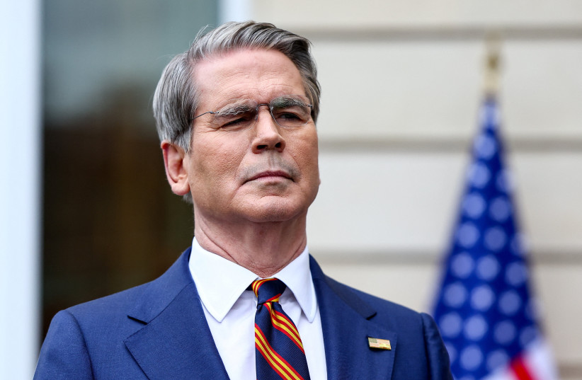 US Treasury Secretary Scott Bessent looks on as he speaks to the media after two days of meetings with a Chinese delegation, in Paris, France March 16, 2026