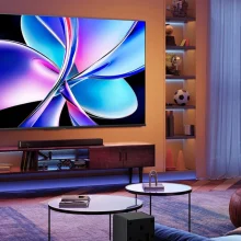 living room with Hisense QD7 TV mounted on wall