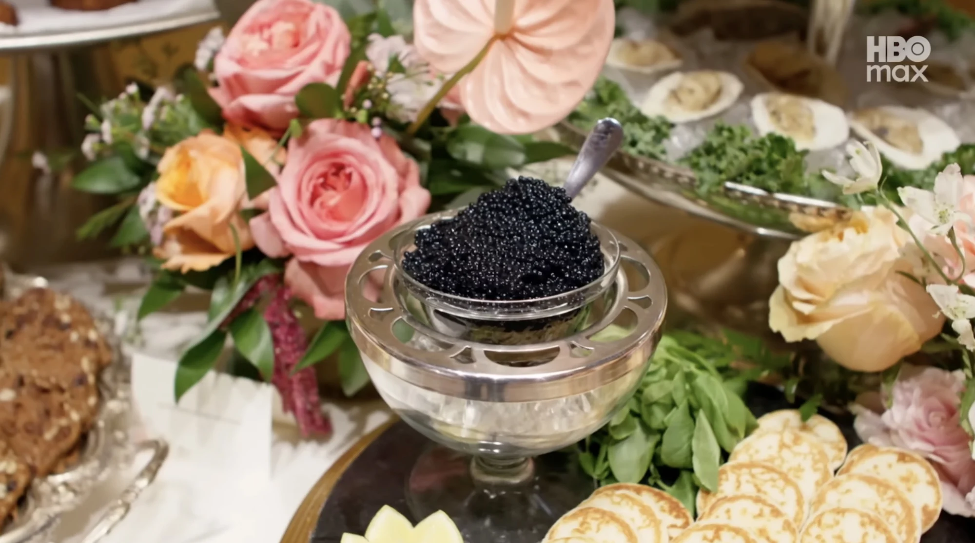 Caviar surrounded by flowers.