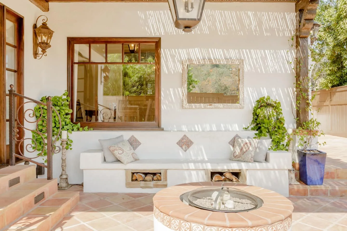 Image may contain Lamp Indoors Interior Design Home Decor Plant Architecture Building Furniture and Living Room