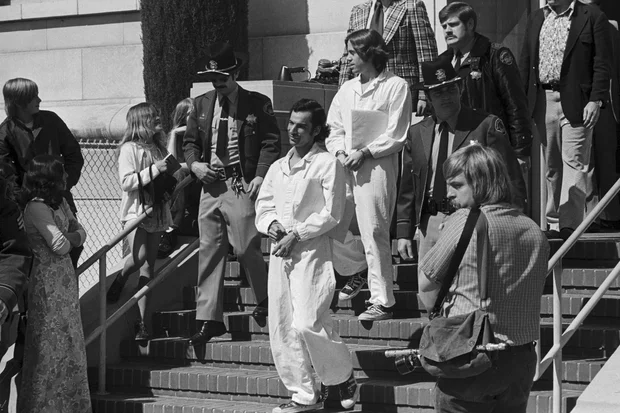 Members of Symbionese Liberation Army in Handcuffs 