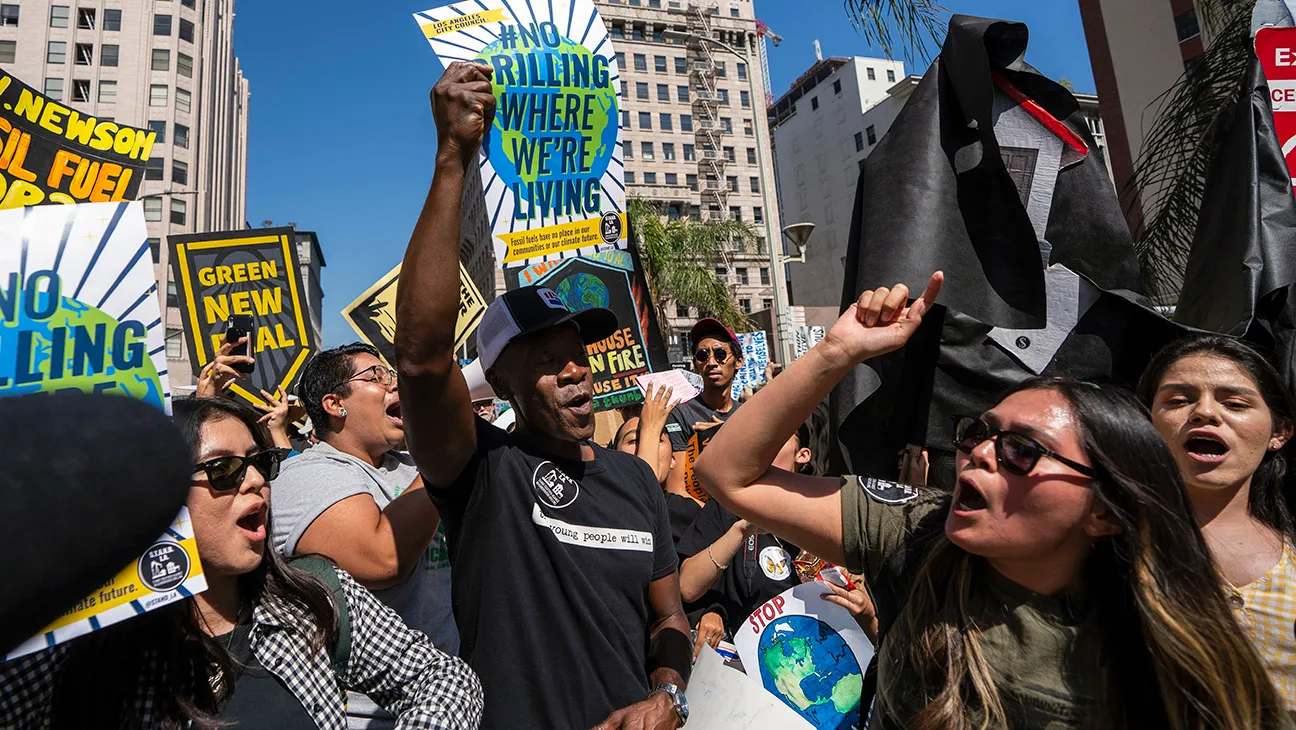 Actor Don Cheadle (C) participates in the Global Climate Strike demonstration in Los Angeles, California on September 20, 2019.
