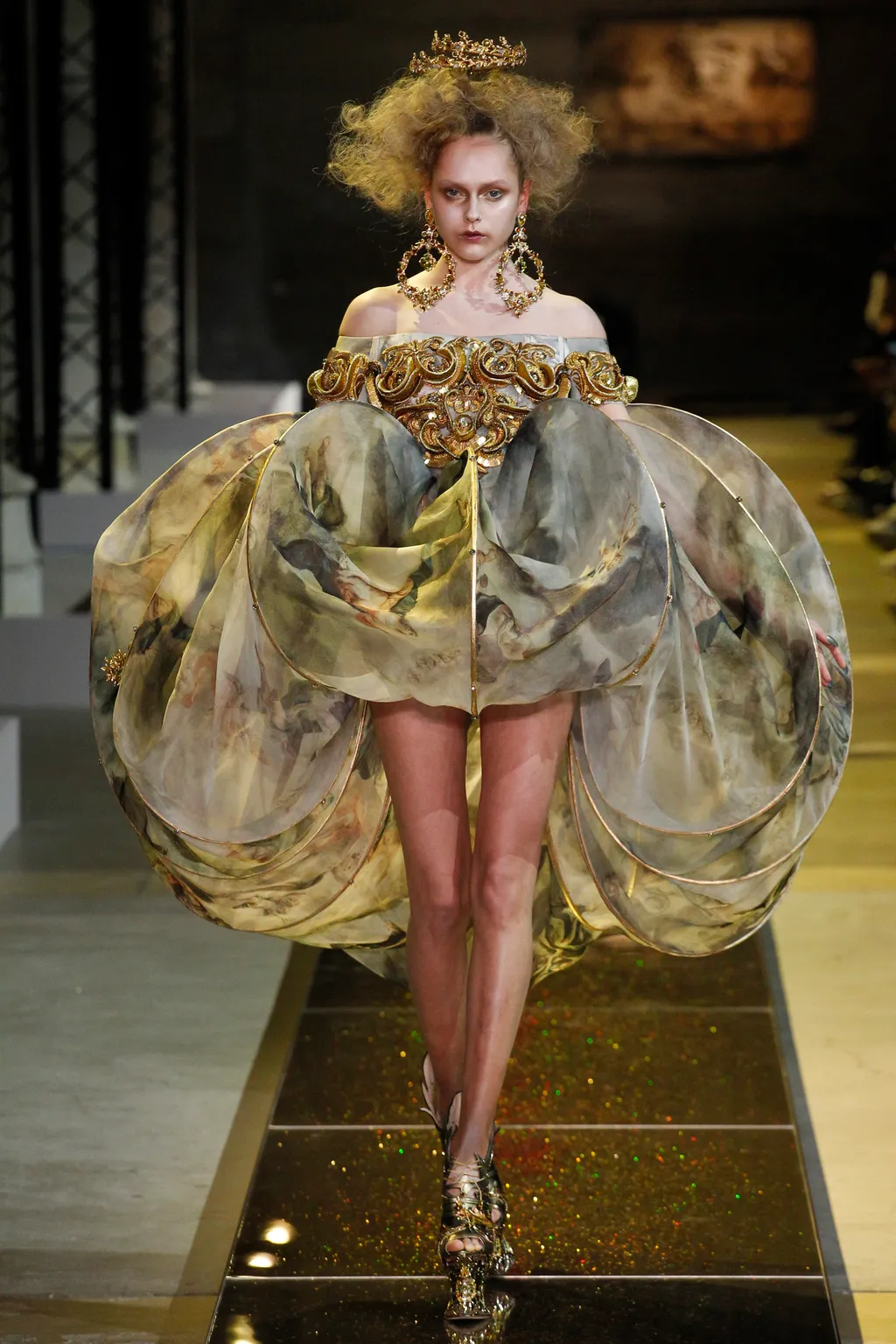 This image may contain Human Person Clothing Apparel Footwear Shoe Runway Fashion Evening Dress Gown and Robe