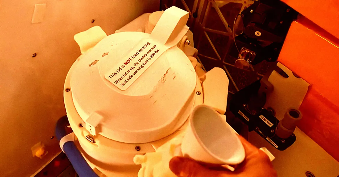 NASA's director of flight operations, Norm Knight, told reporters that a controller issue had caused the fan of the space toilet to jam.