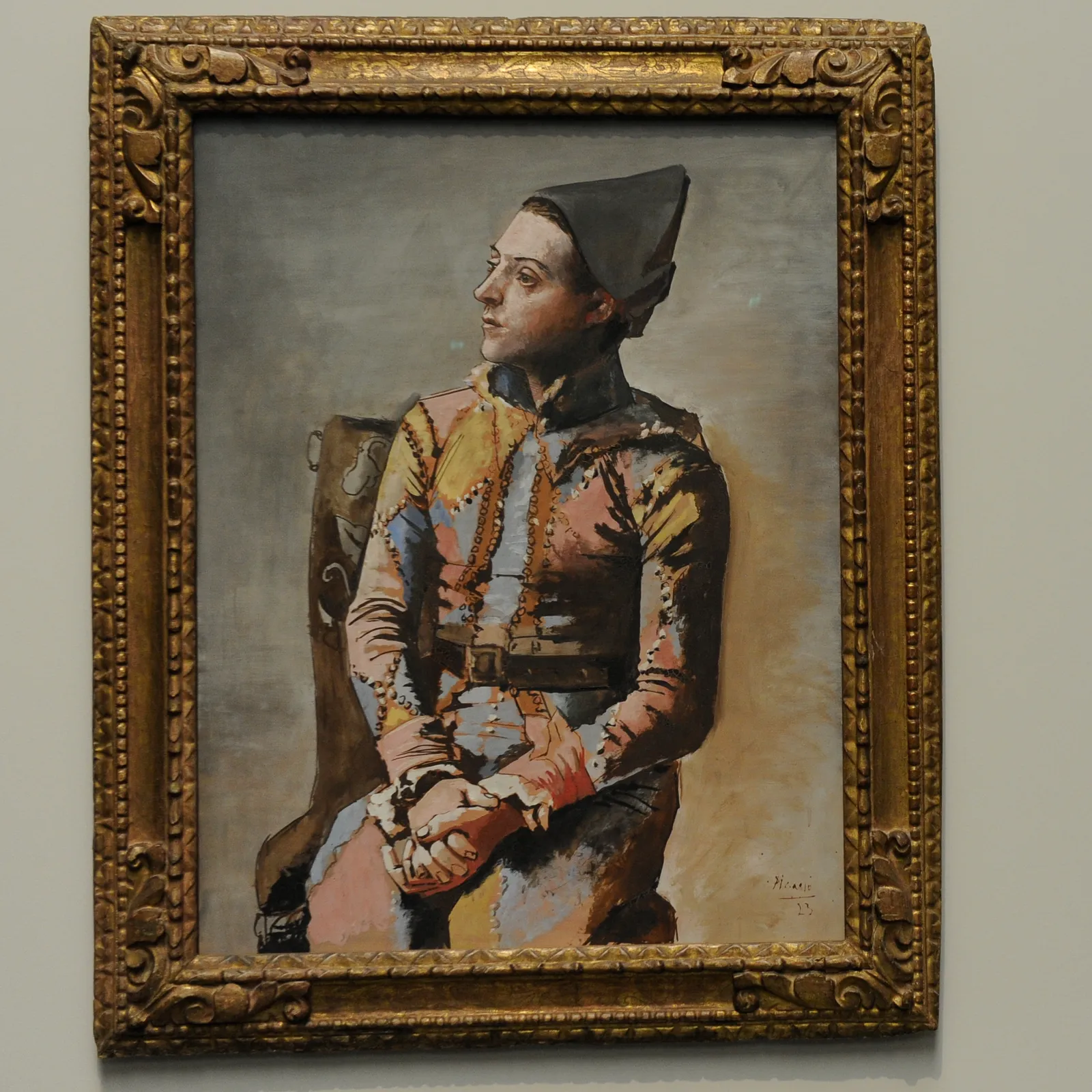 MADRID SPAIN MARCH 17 A cameraman films the painting 'Arlequin sentado' by Pablo Picasso during the opening for the...