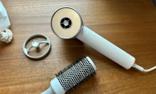 Zuvi Halo hair dryer with gentle air attachment, round brush, and makeup bag
