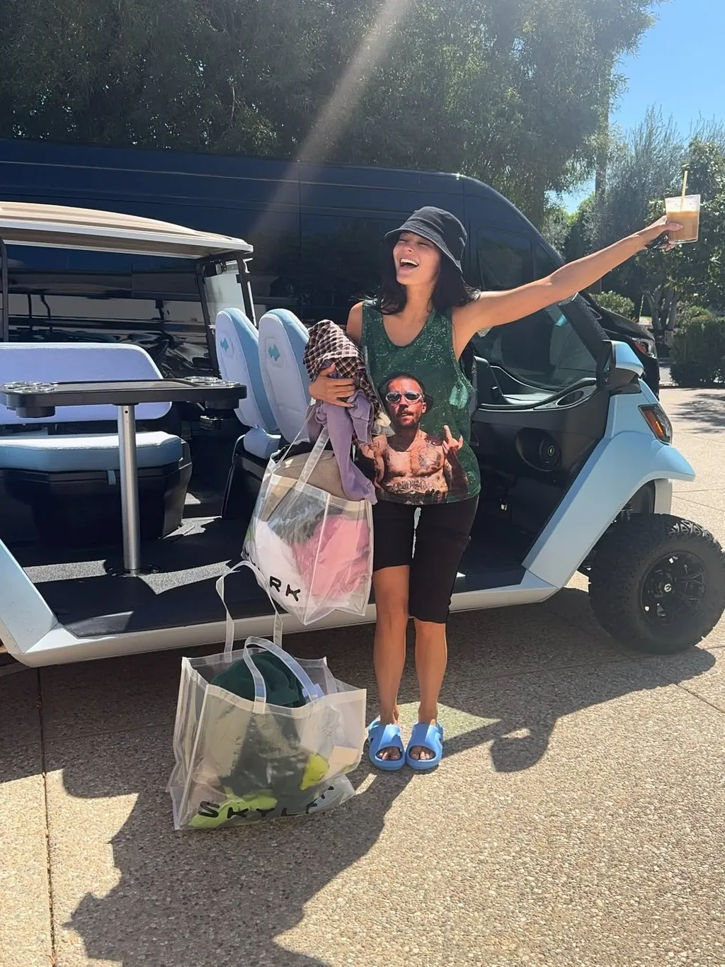 Image may contain Kylie Jenner Freddie Williams II Fun Vacation Person Road Trip Adult Accessories Bag and Handbag