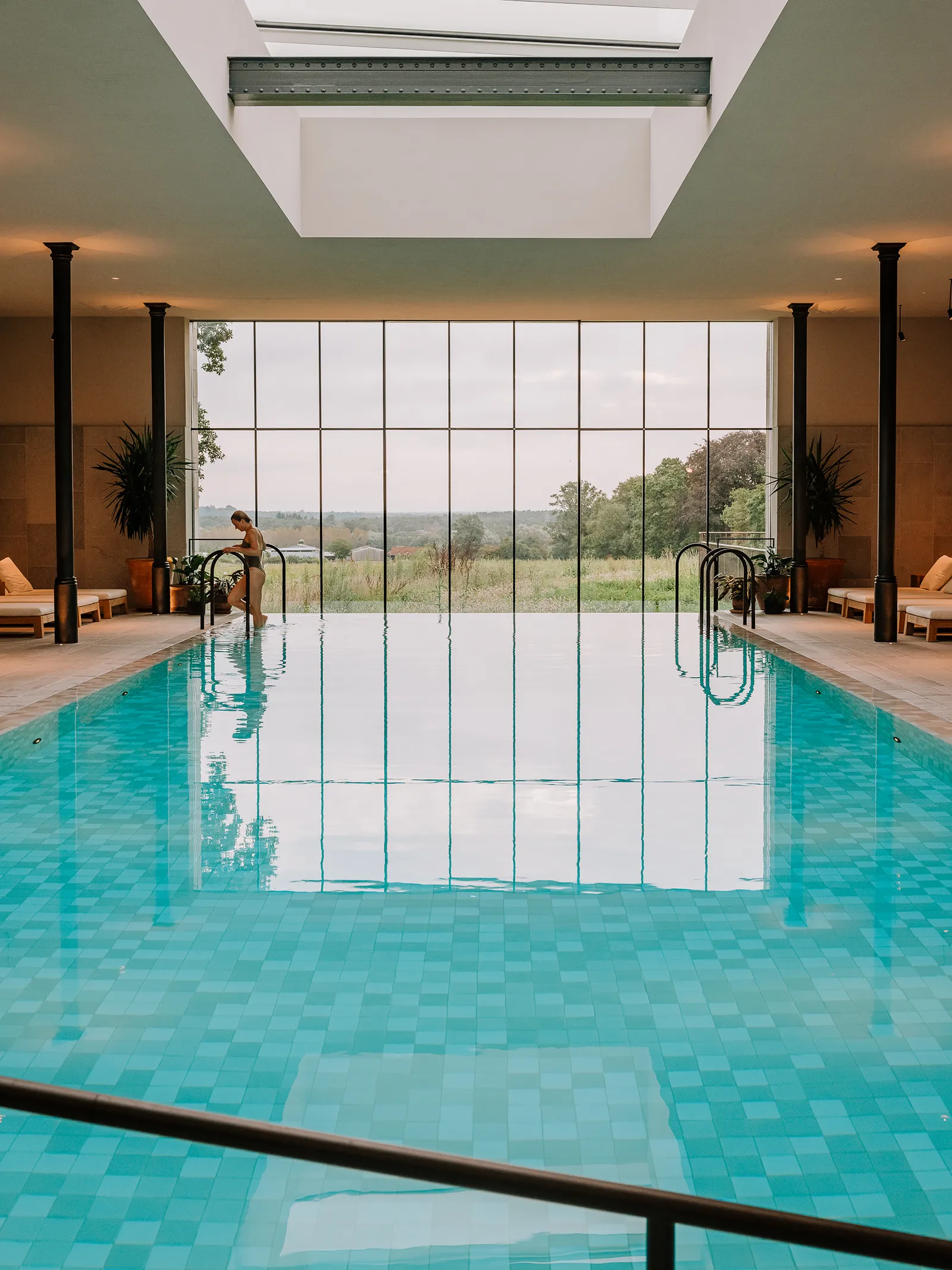 Image may contain Pool Water Floor Plant Swimming Pool Person Chair Furniture and Outdoors