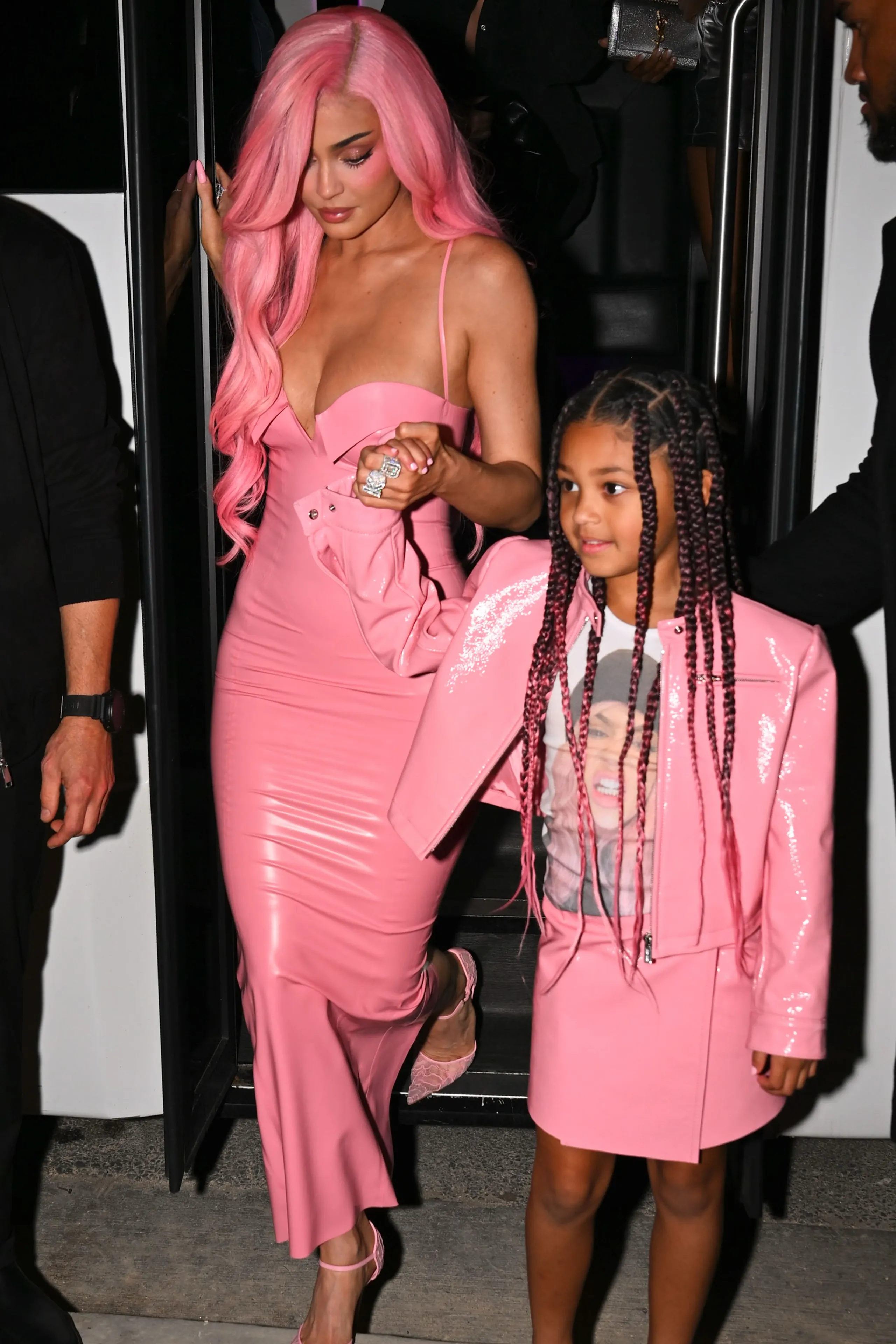 Image may contain Kylie Jenner Adult Person Hair Pink Hair Wedding Face Head Accessories Bag and Handbag