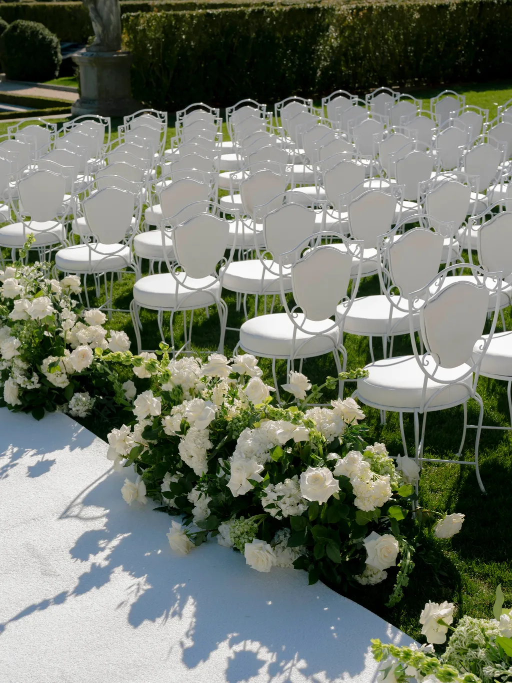 Image may contain Grass Plant Flower Petal Indoors Outdoors Lawn Chair Furniture and Table