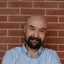 Headshot of Julian Dossett