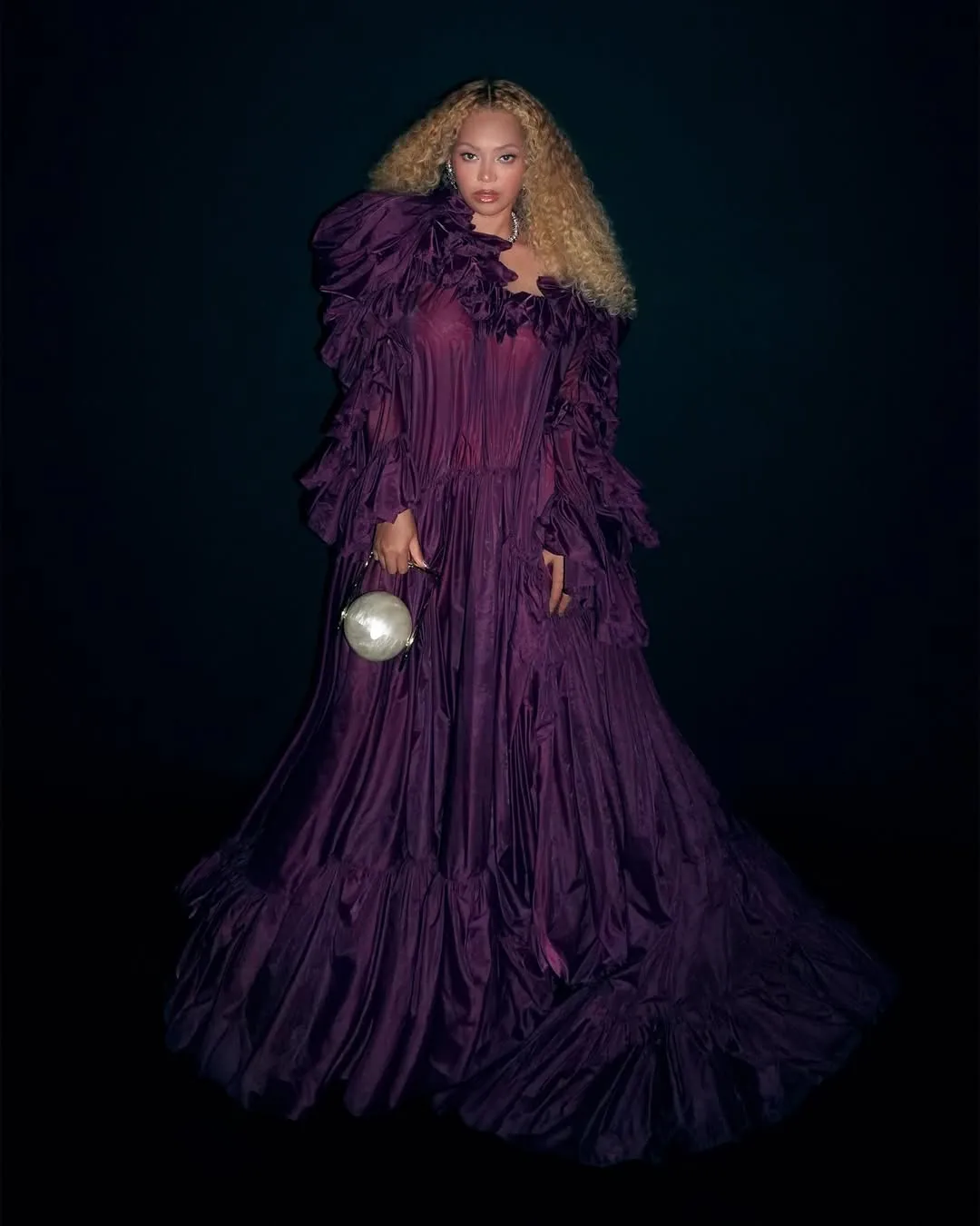 Image may contain Beyonc Clothing Dress Formal Wear Fashion Gown Adult Person Performer and Solo Performance