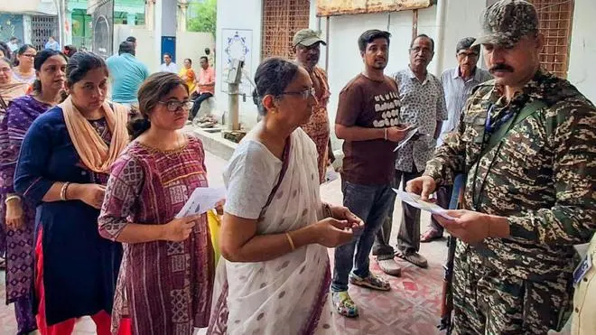 Voters wait in a queue at polling booths in Baharampur and Lalbag areas of Murshidabad during the West Bengal Assembly election on April 23, 2026. As West Bengal recorded one of its highest-ever turnouts, the Supreme Court cited the absence of violence and urged faith in the democratic process. Voters wait in a queue at polling booths in Baharampur and Lalbag areas of Murshidabad during the West Bengal Assembly election on April 23, 2026. As West Bengal recorded one of its highest-ever turnouts, the Supreme Court cited the absence of violence and urged faith in the democratic process.