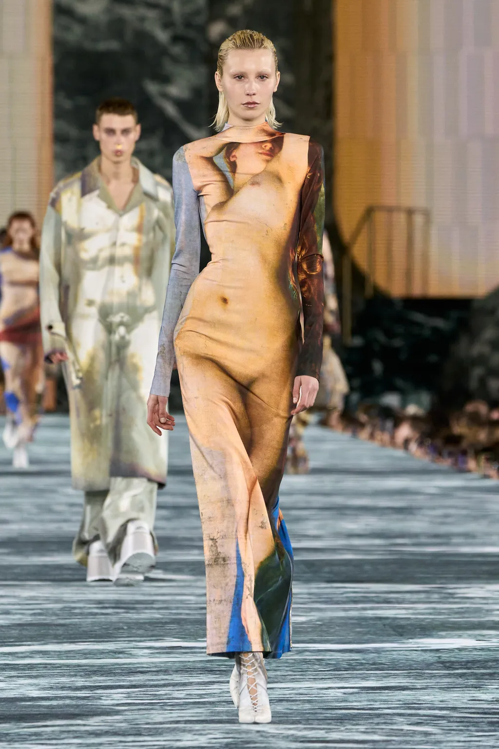 Image may contain Human Person Fashion Clothing Apparel and Runway