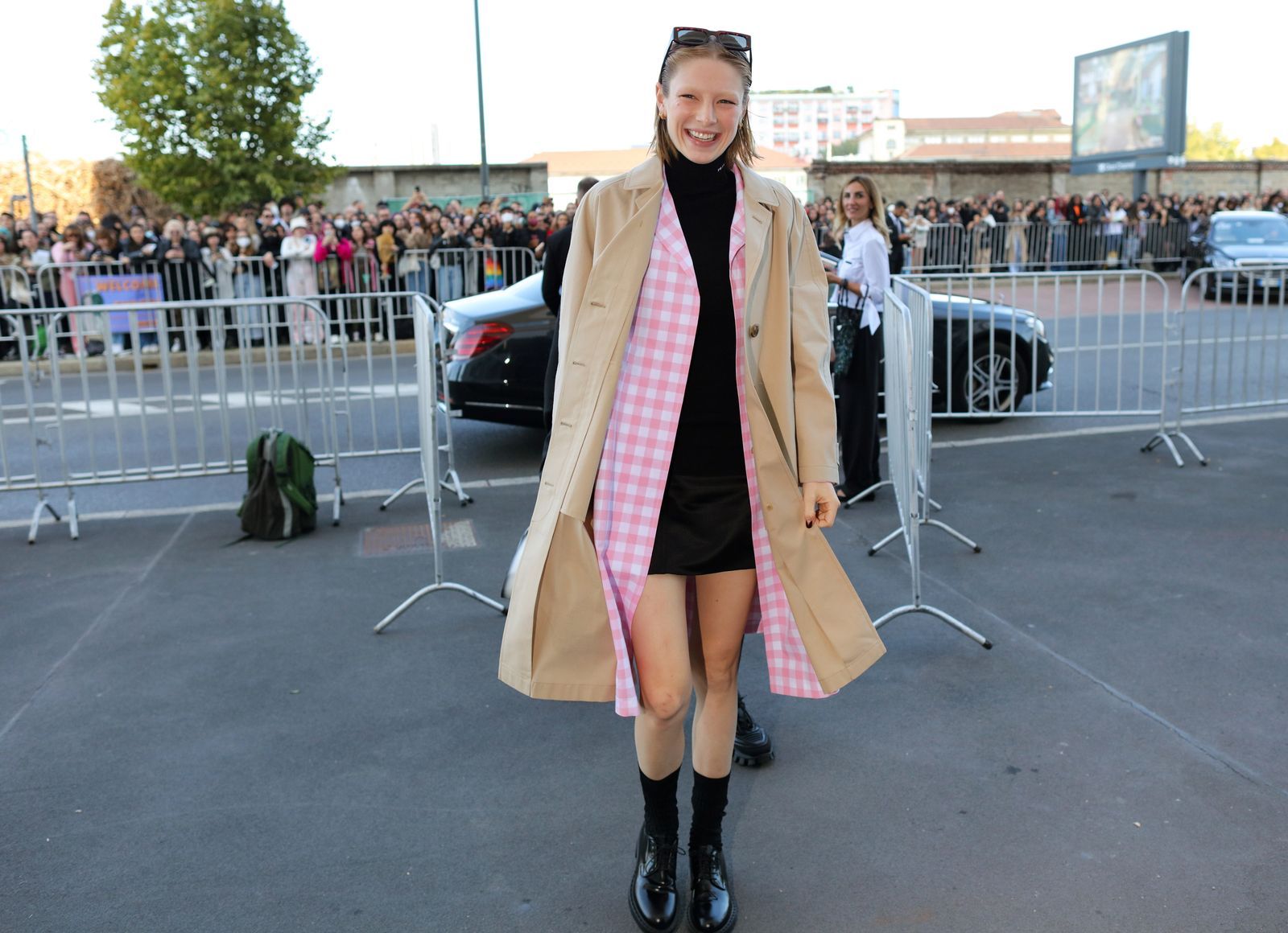 Image may contain Clothing Apparel Coat Overcoat Human Person Footwear and Shoe