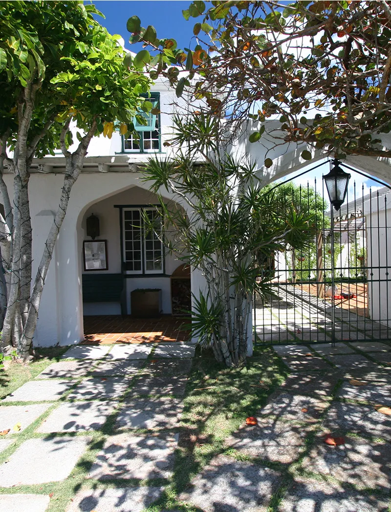 Image may contain Architecture Building House Housing Villa Plant Garden Nature Outdoors Backyard and Yard