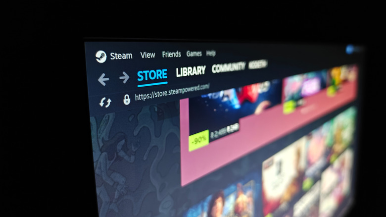 Steam Store page open on a computer monitor showing discounted games.