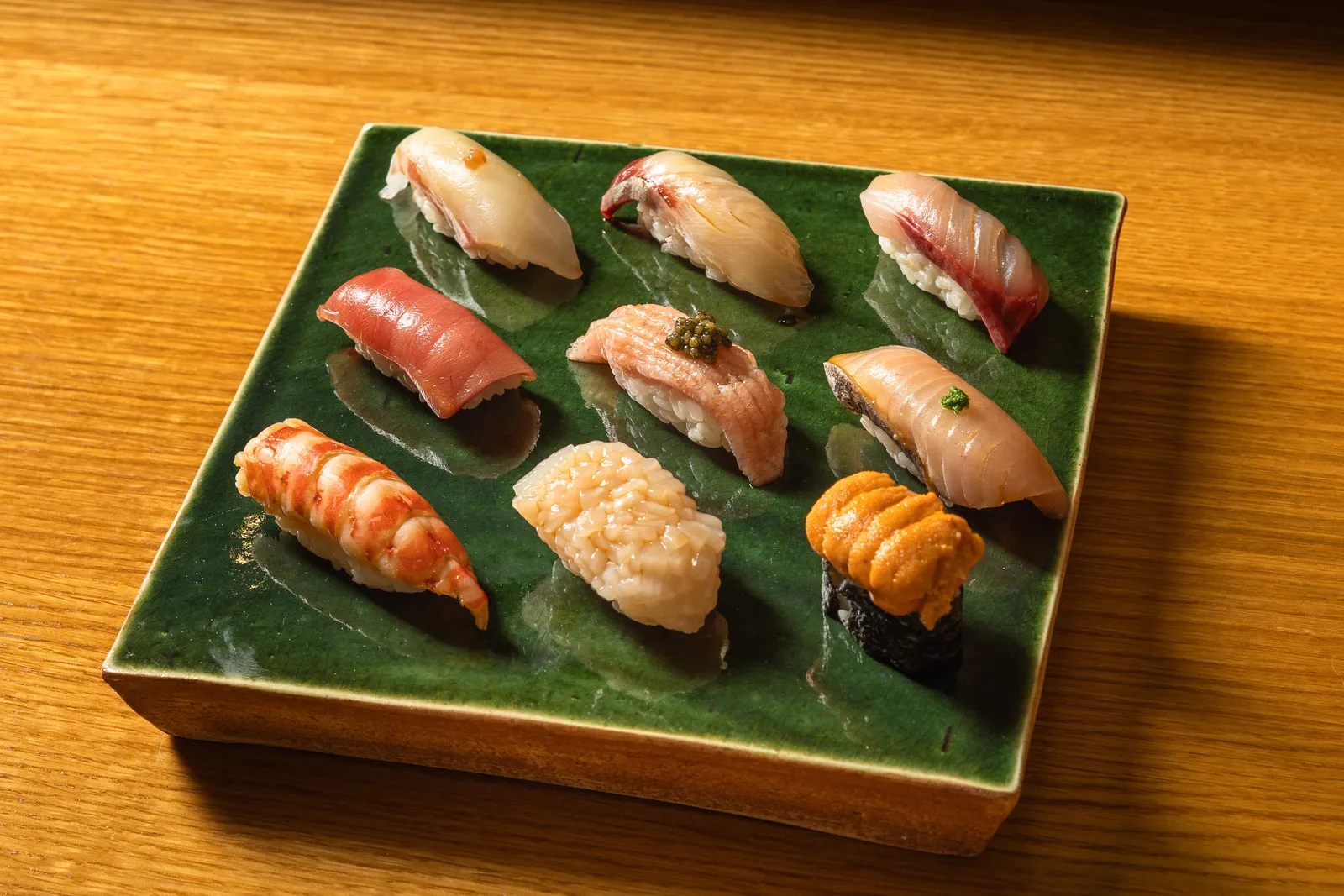 Image may contain Food Meal Dish Food Presentation Plate Grain Produce Rice and Sushi