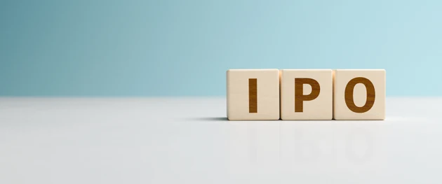 Wooden toy cubes forming the abbreviation "IPO". Initial public offering, Stock exchange, shares