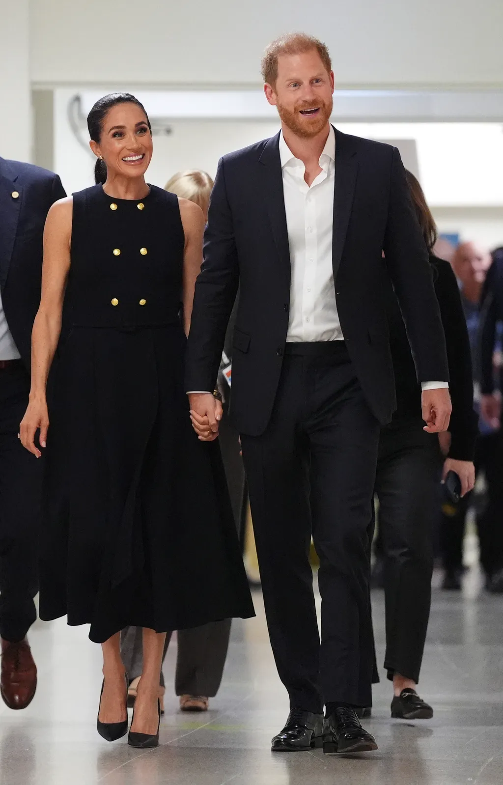 Image may contain Prince Harry Duke of Sussex Meghan Duchess of Sussex Blazer Clothing Coat Jacket and Person