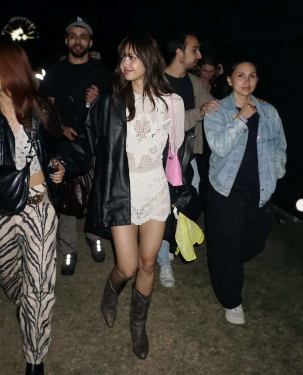 Image may contain Nicole Fujita Clothing Coat Jacket Footwear Shoe Blazer Hat Person Teen Adult and Photobombing