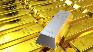 Rows of rendered gold bars and one silver bar Rows of rendered gold bars and one silver bar