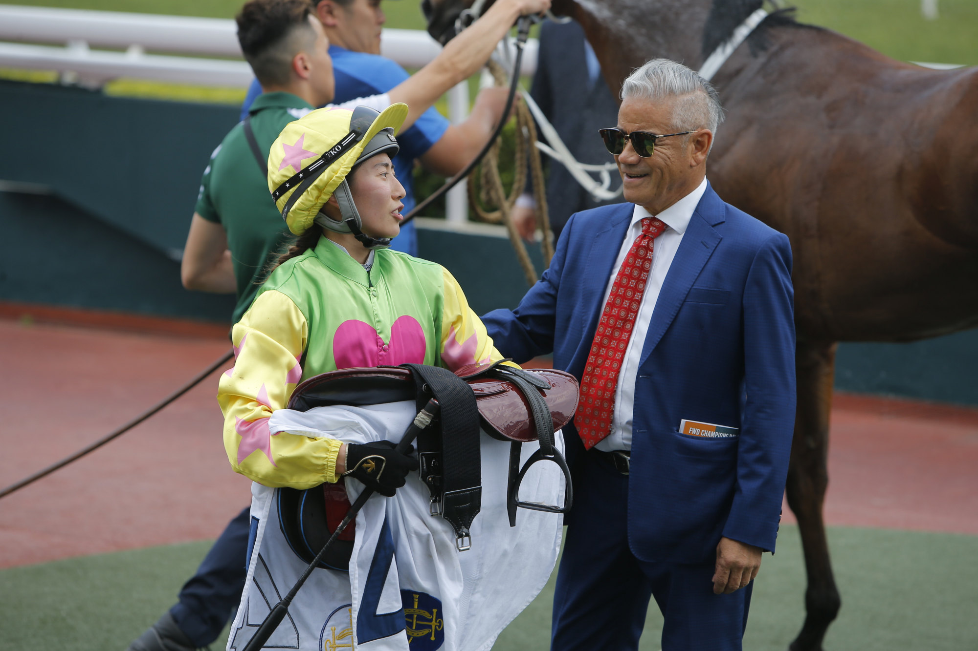 Apprentice Britney Wong and trainer Tony Cruz are all smiles. Apprentice Britney Wong and trainer Tony Cruz are all smiles.