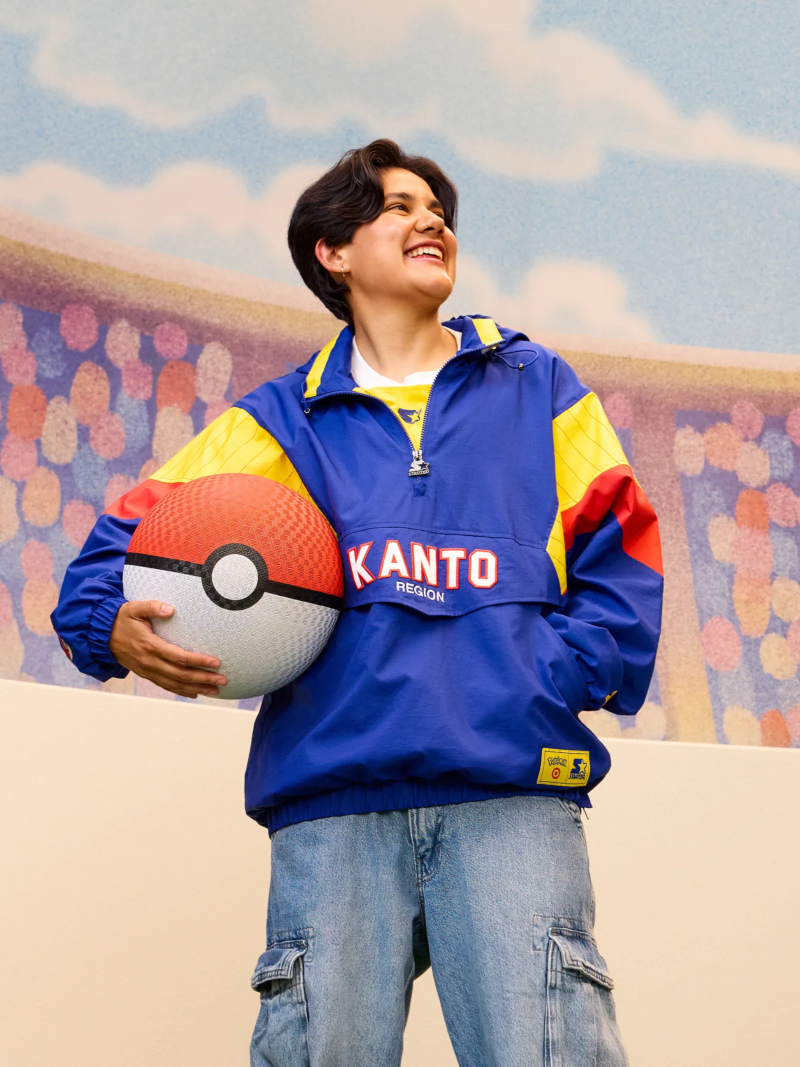 Image may contain Clothing Coat Ball Football Soccer Soccer Ball Sport Pants Jacket and Volleyball