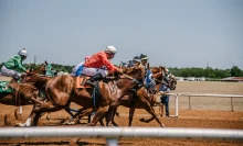jockeys on horses racing