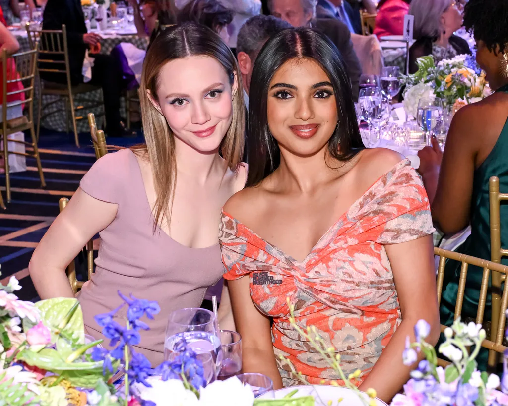 Image may contain Iris Apatow Person Photobombing Adult Urban Face Head Happy Smile Clothing and Dress