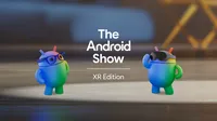 Two 3D Android bots standing on a wooden stage under a spotlight. The mascot on the left is wearing blue smart glasses, and the mascot on the right is wearing a black XR headset. Text in the center reads: "The Android Show XR Edition."