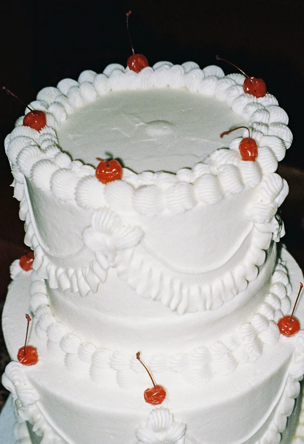 Image may contain Cake Dessert Food Birthday Cake Cream Wedding and Wedding Cake