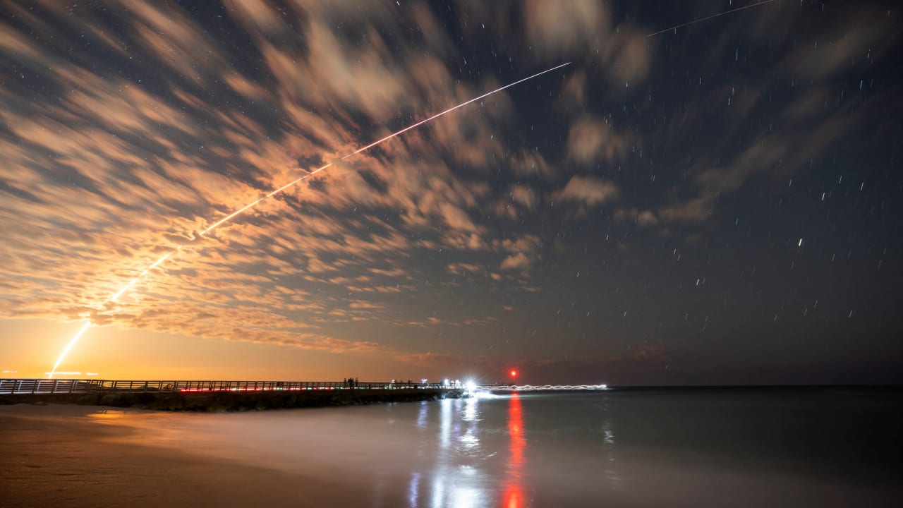 The SpaceX Falcon 9 rocket carrying Starlink satellites is seen over Sebastian Inlet after launching from Cape Canaveral, Florida, February 26, 2025. The SpaceX Falcon 9 rocket carrying Starlink satellites is seen over Sebastian Inlet after launching from Cape Canaveral, Florida, February 26, 2025.