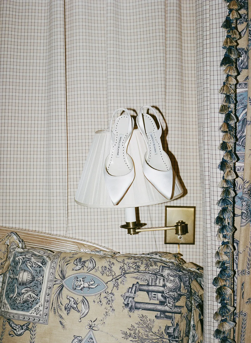 Image may contain Accessories Bag Handbag Indoors Interior Design and Lamp
