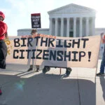 Pro and anti-Trump demonstrators rally outside the U.S. Supreme Court.