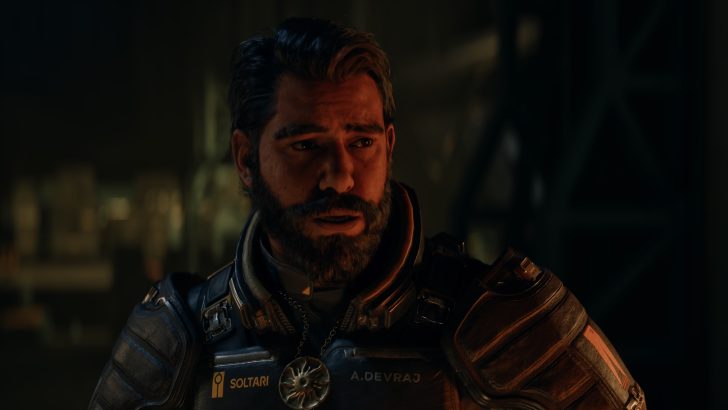 A character in 'Starfield' with a detailed space suit labeled 'SOLTARI' and 'A.DEVRAJ'.