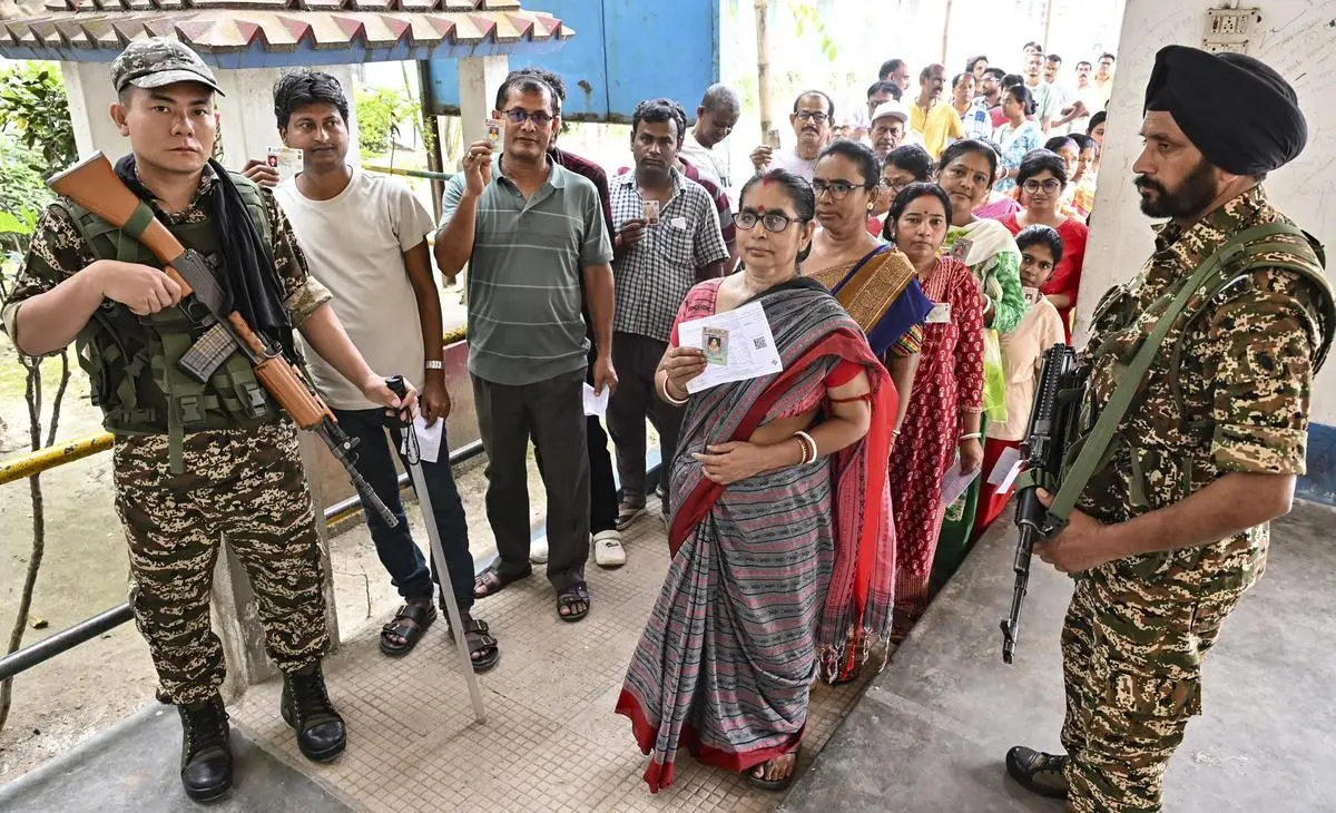 Security personnel keeping vigil during voting in the first phase of West Bengal Assembly election, in Malda, on April 23, 2026.